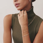 14K Real Solid Gold Peridot Birthstone Station Bracelet with green peridot gemstones, perfect for August birthdays and elegant, everyday wear.