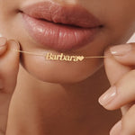 Woman Holding Real 14K Solid Gold Personalized Name Necklace Close To Lips