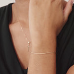 14K Real Solid Gold Wheat Chain Bracelet with an adjustable length and secure spring ring clasp, featuring an elegant and durable wheat chain link design.